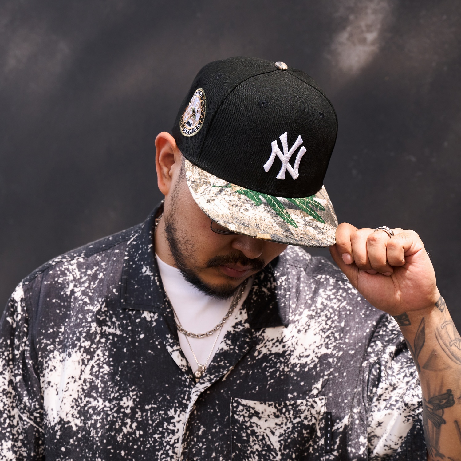 Бейсболка NEW ERA 9FIFTY SNAPBACK MLB NEW YORK YANKEES REAL TREE ЧЕРНАЯ / КАМУФЛЯЖНАЯ