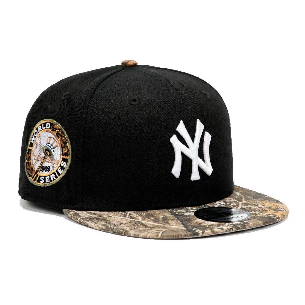 Бейсболка NEW ERA 9FIFTY SNAPBACK MLB NEW YORK YANKEES REAL TREE ЧЕРНАЯ / КАМУФЛЯЖНАЯ